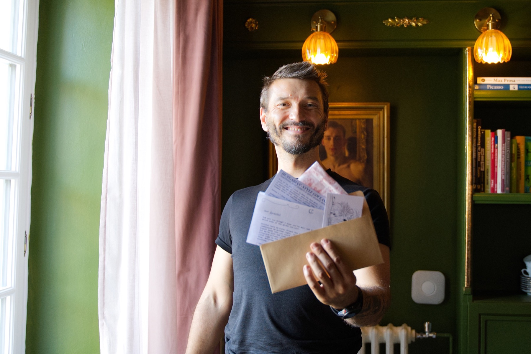 Amadeus smiling at the château while holding the complete Château Letter