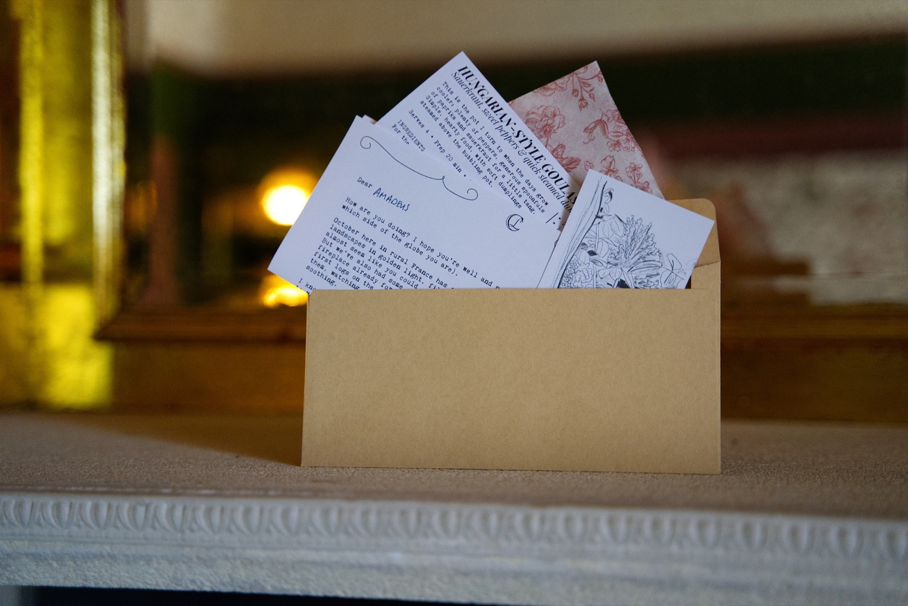 A complete Château Letter with its personal letter, seasonal recipe, château sketch and tissue-paper wrapping